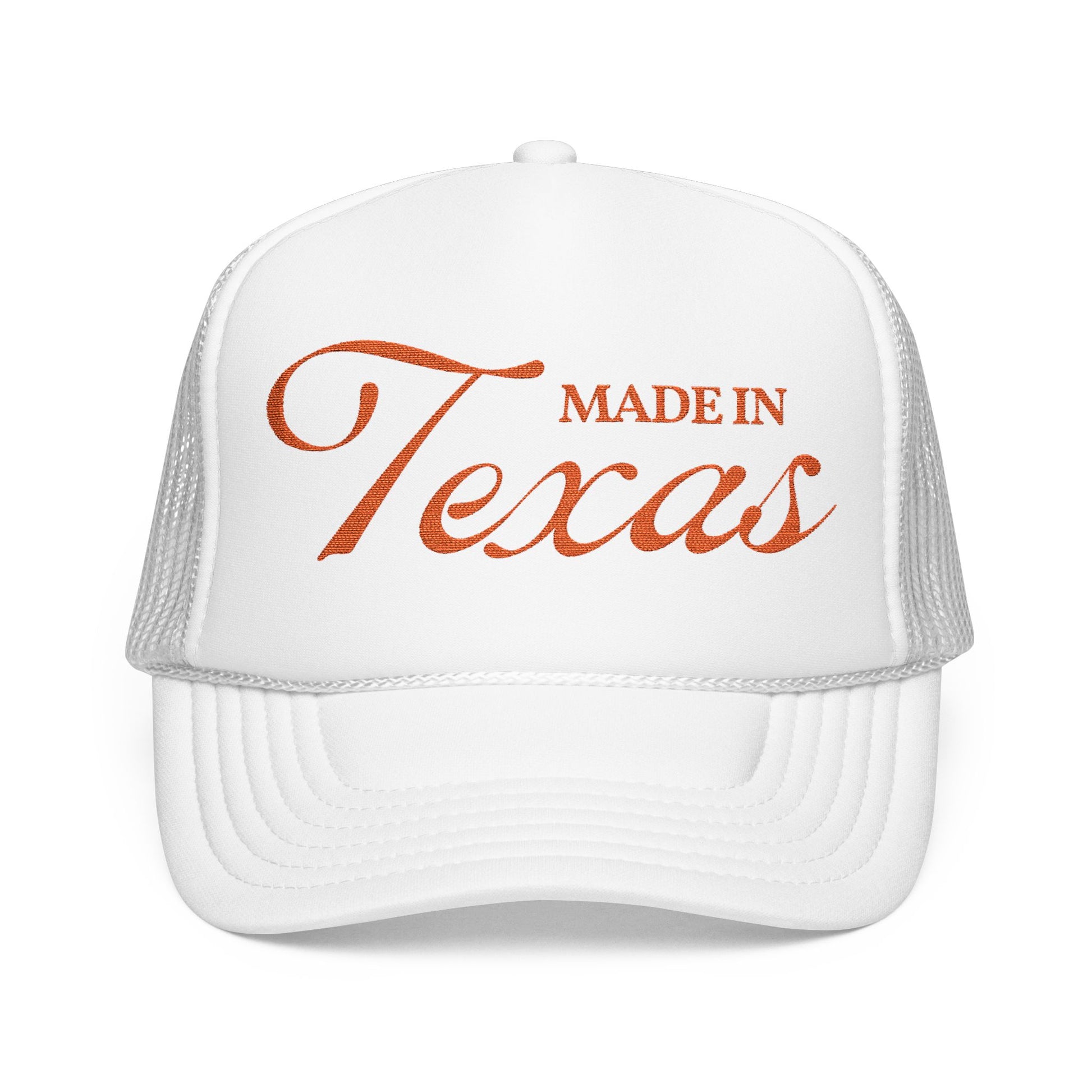 White cap with 'Made in Texas' text in red on a white background