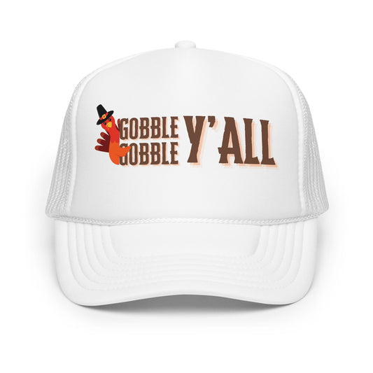 white thanksgiving  trucker hat with "gobble gobble y'all" and a turkey on the front foam panel
